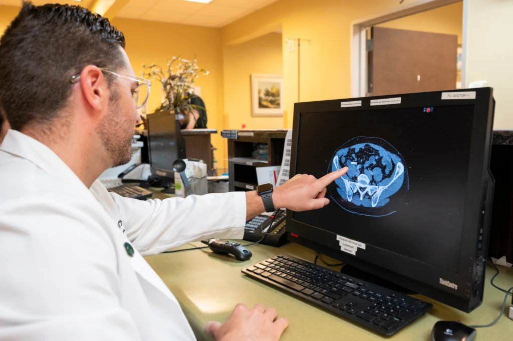 Complete Care freestanding ER doctor conducting a CT scan